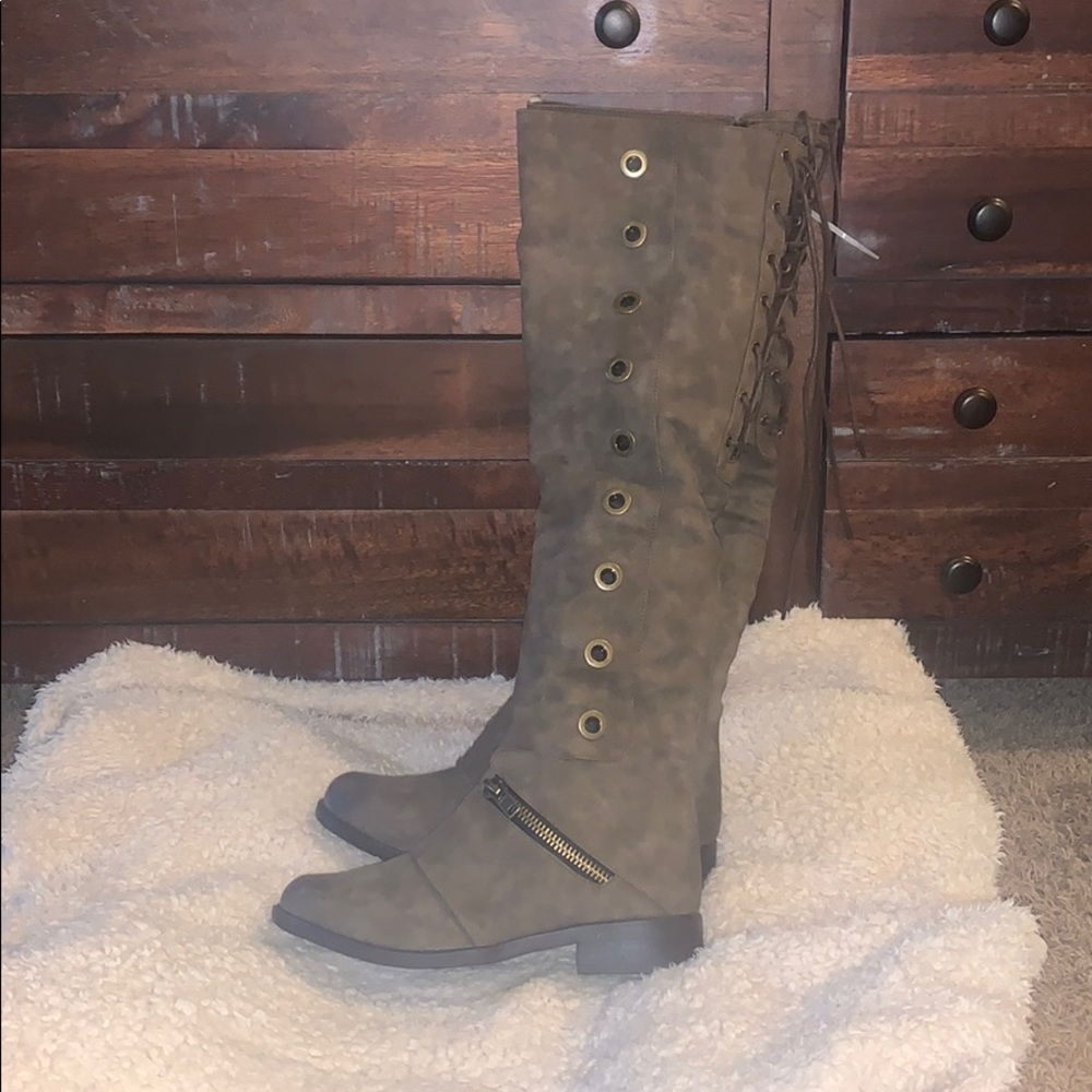 Tall brown riding boots